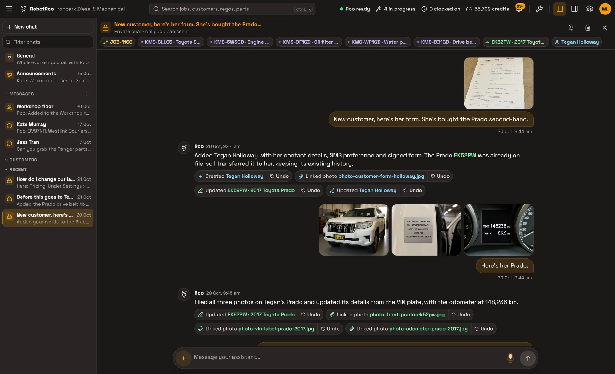 RobotRoo on a computer: a chat with Roo. A photo of a handwritten new-customer form becomes Tegan Holloway’s customer record, and photos of a Prado’s front, VIN plate and odometer update the vehicle, each change listed with Undo